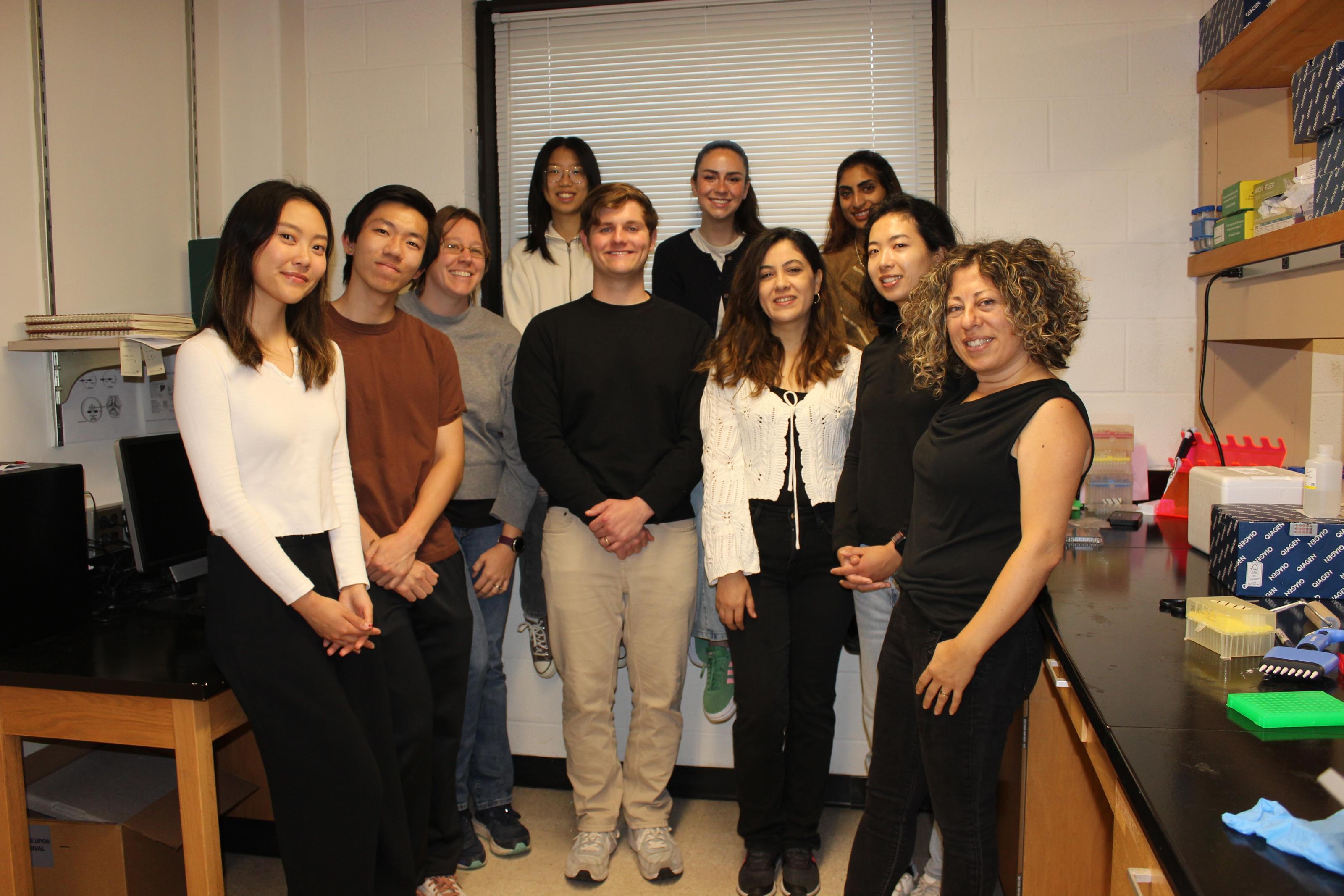 Group photo of current staff and students in the Aydemir Lab