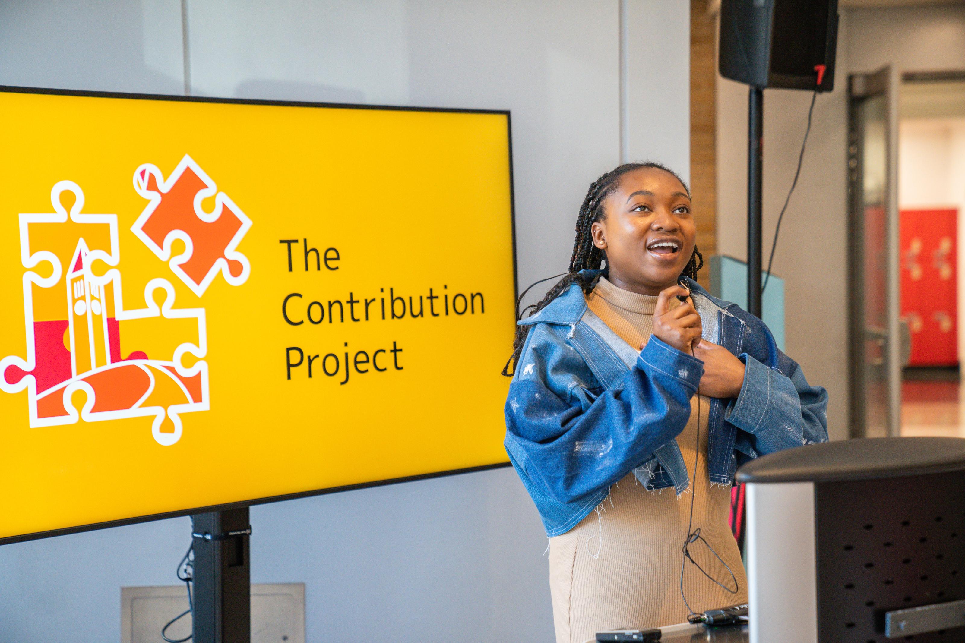 A student discusses her contribution project
