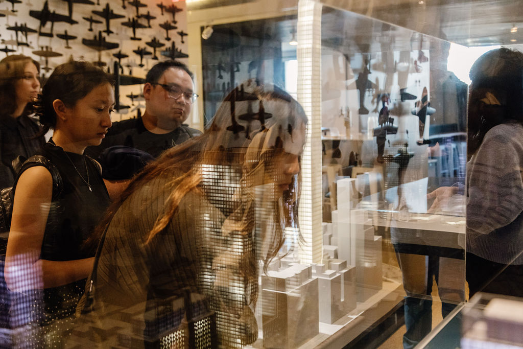 Students look at a 3-dementional display at SHOP architects, a full service design firm