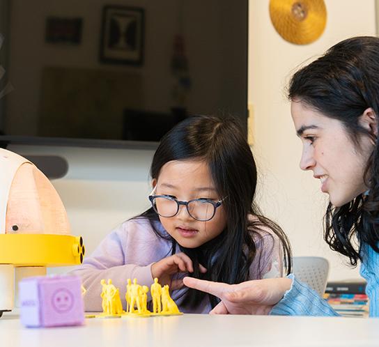 e-MoBo is a robot-mediator that helps children express their emotions by working together with a caregiver. 