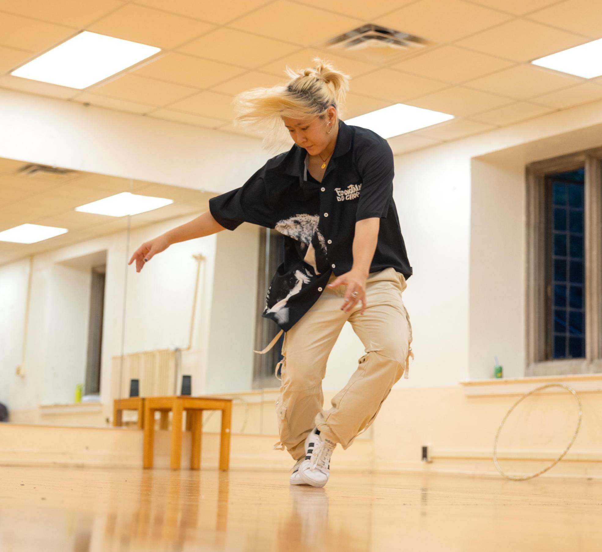 a member of Absolute Zero practices hip hop dancing