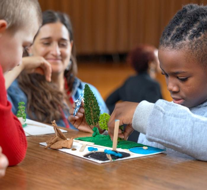 Elementary school students create outdoor diagrams