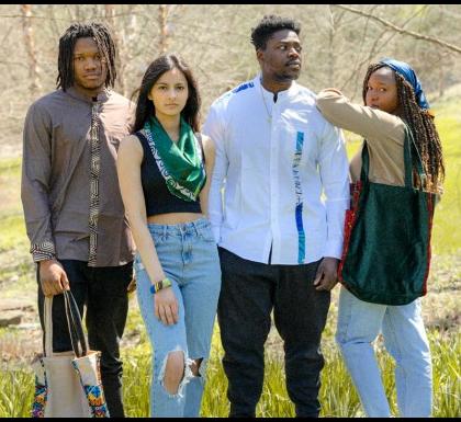 Students from Cornell’s Nigerian Students Association model items – designed and produced by Nigerian entrepreneur Esther Olotu – ordered through Crossroads, a student and alumni-run business that funds a health clinic and school in Jeida, Nigeria.