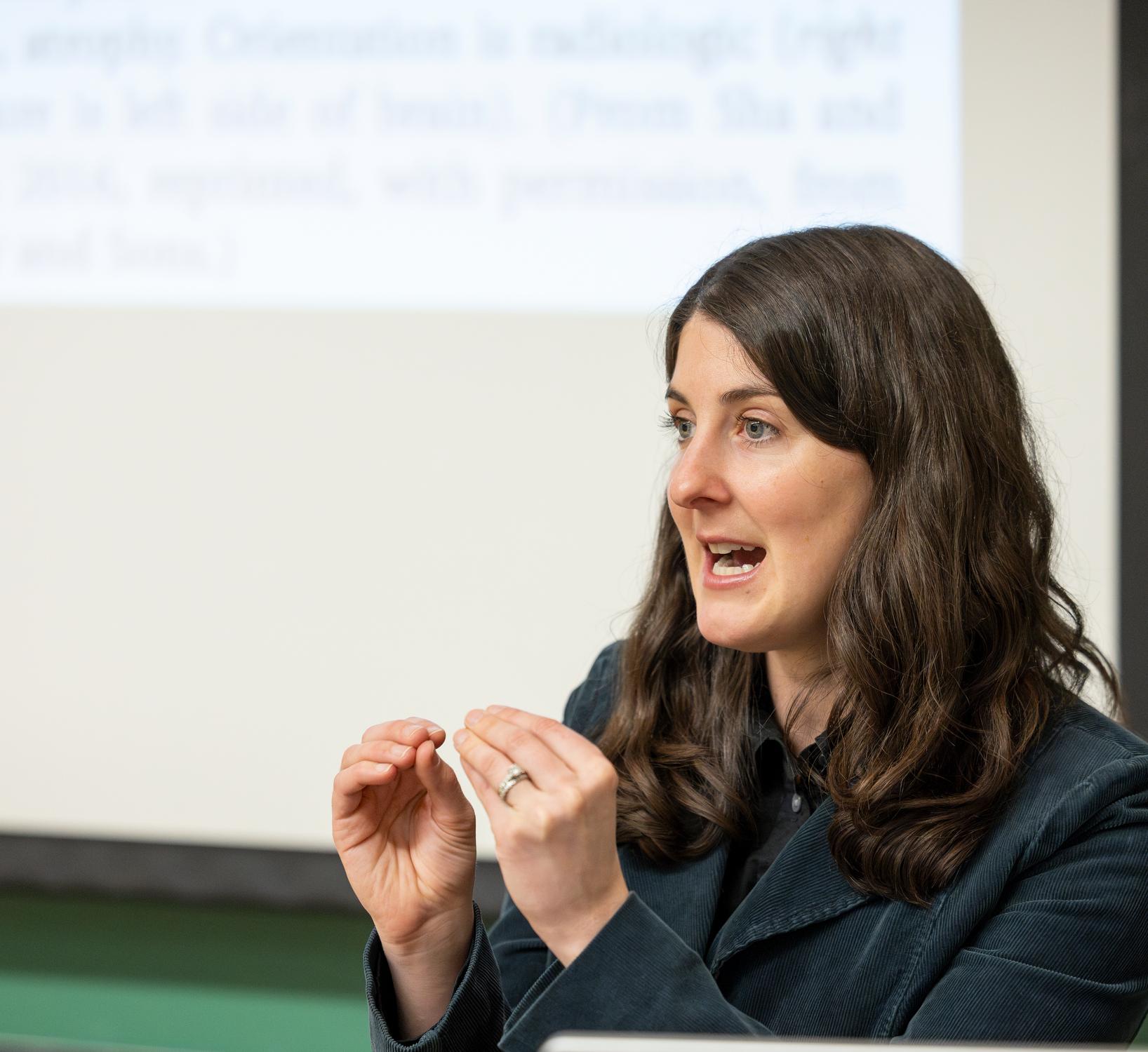 Jenna Wells speaks during class 