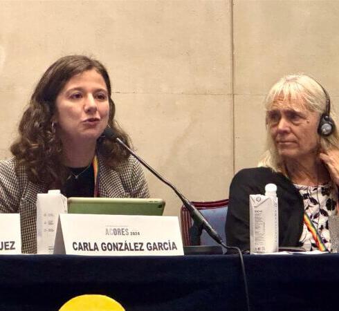 Martha Holden speaks at the CARE conference 