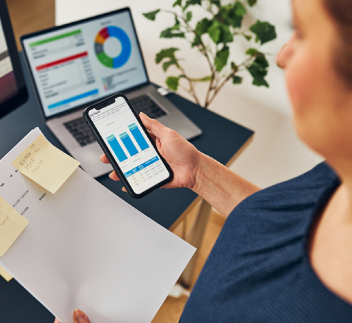 Person multitasking with computers 