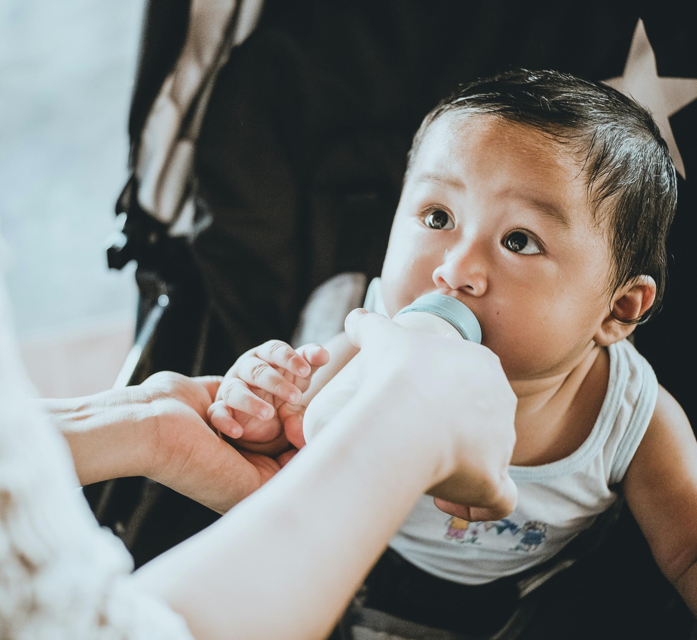 Baby drinking from a bottle 
