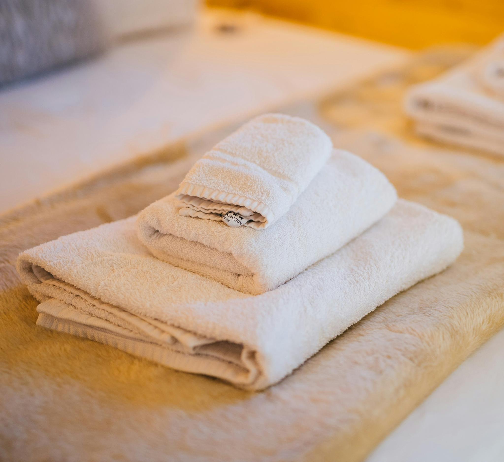 a tack of white towels