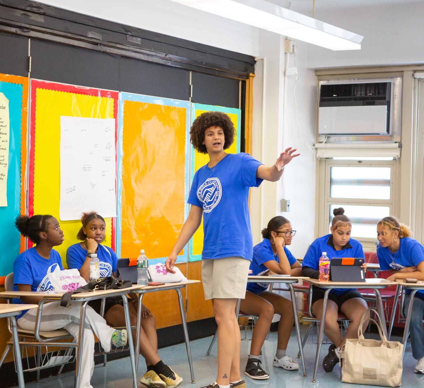 a student teaches children 