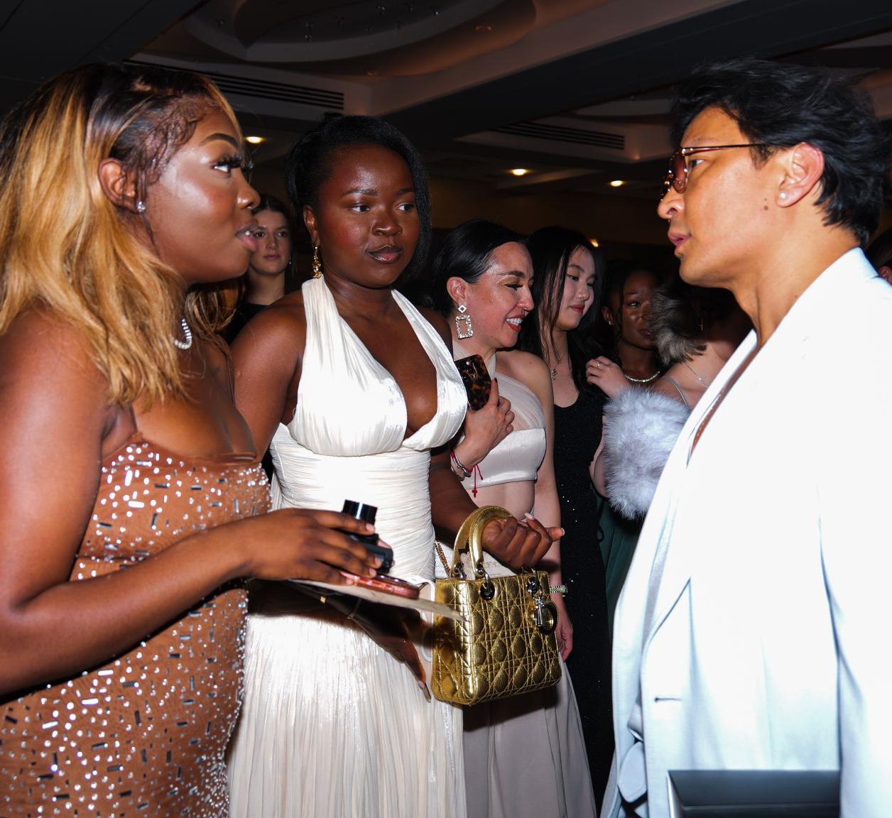 Students speak with Prabal Gurung at the CFIN gala