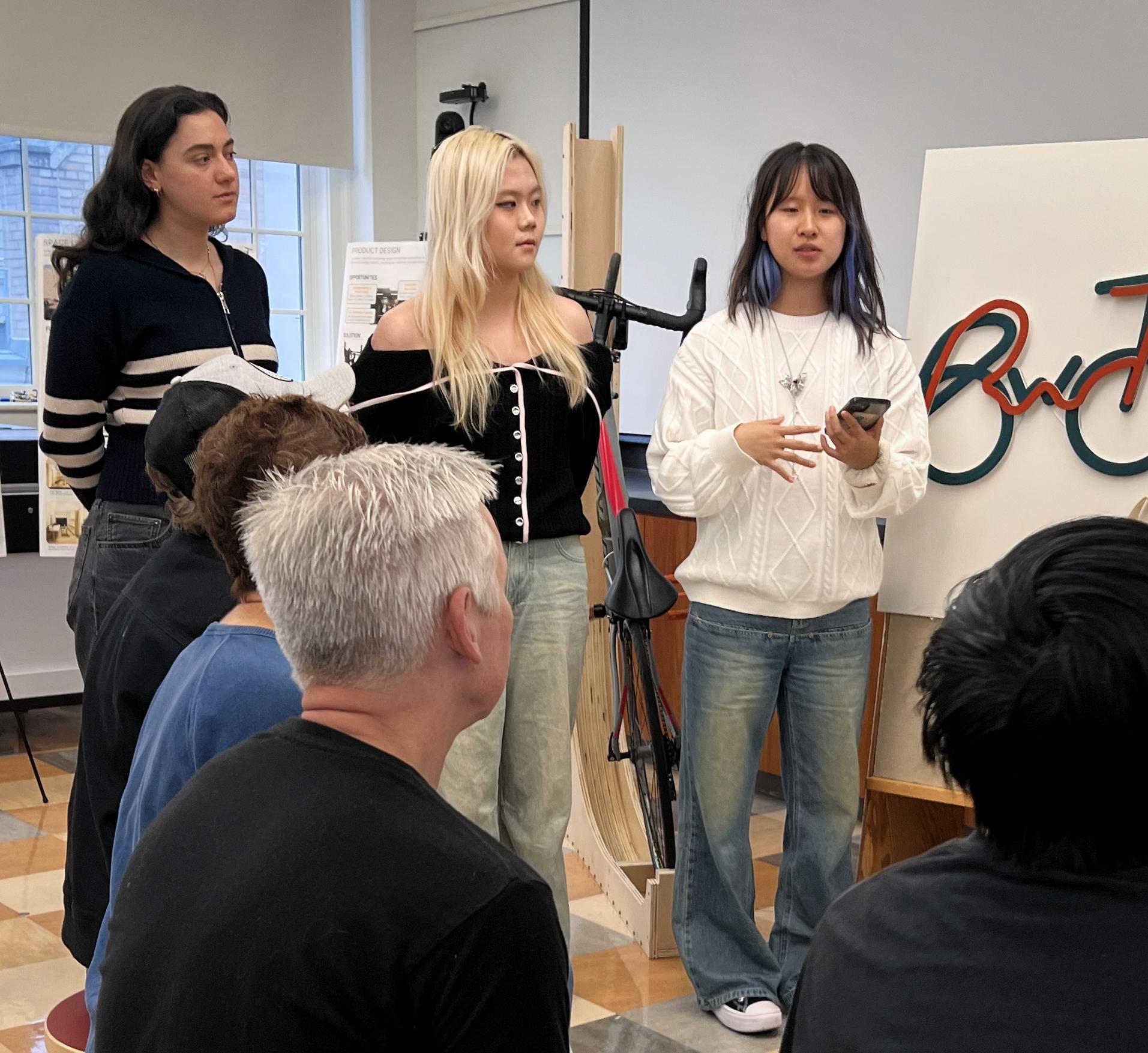Students in So-Yeon Yoon's class present their work to community partner Bike Walk Tompkins