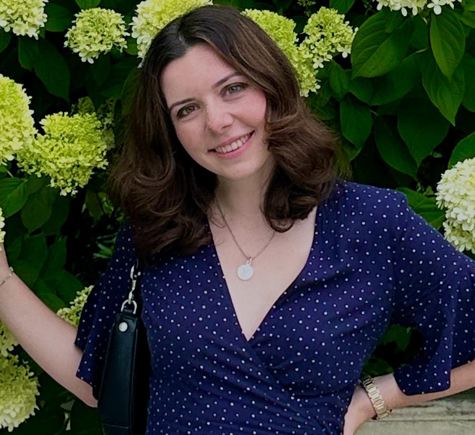 Portrait of Lauren Forstenhausler in front of green hydrangeas
