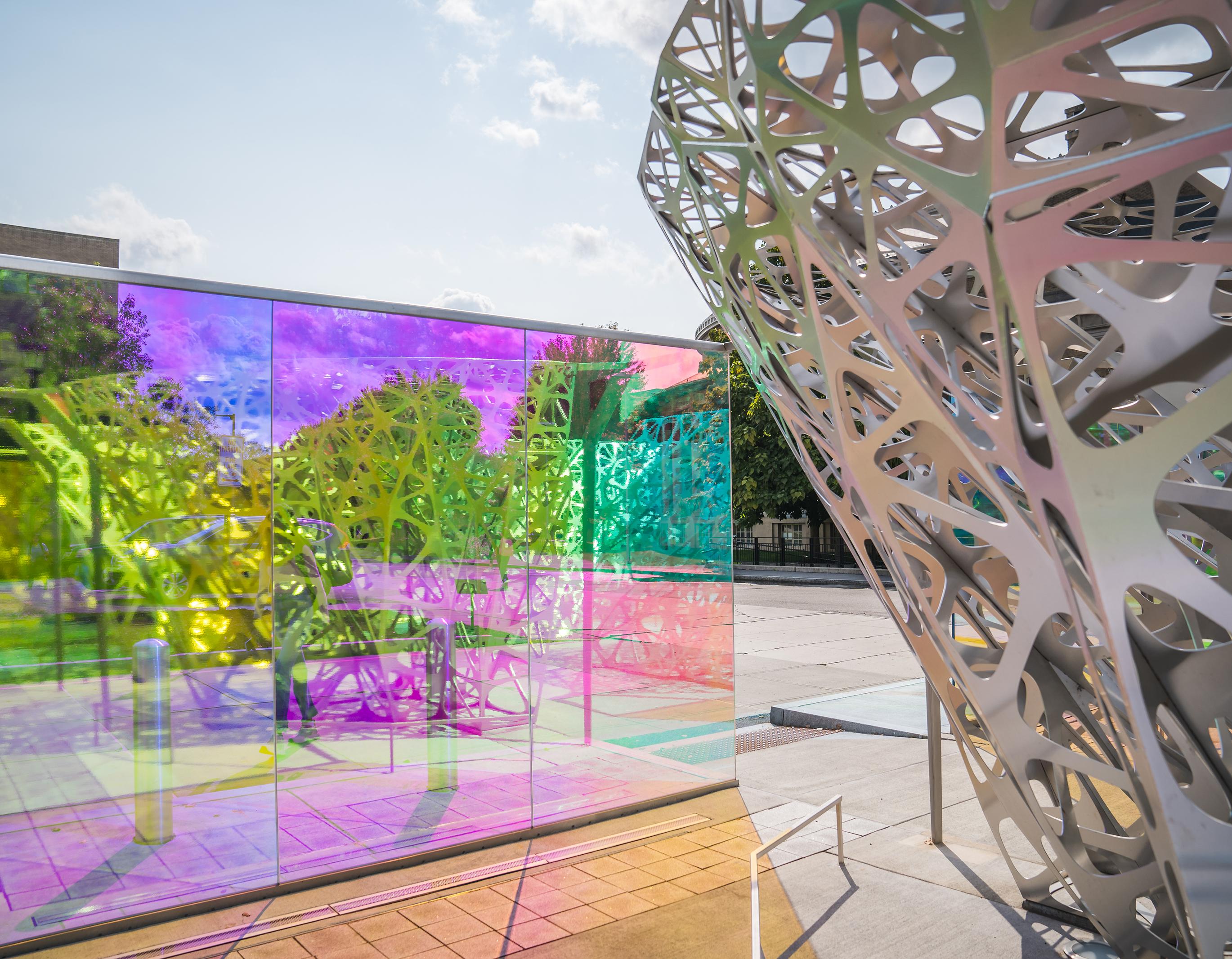 large outdoor metal and colored glass sculpture