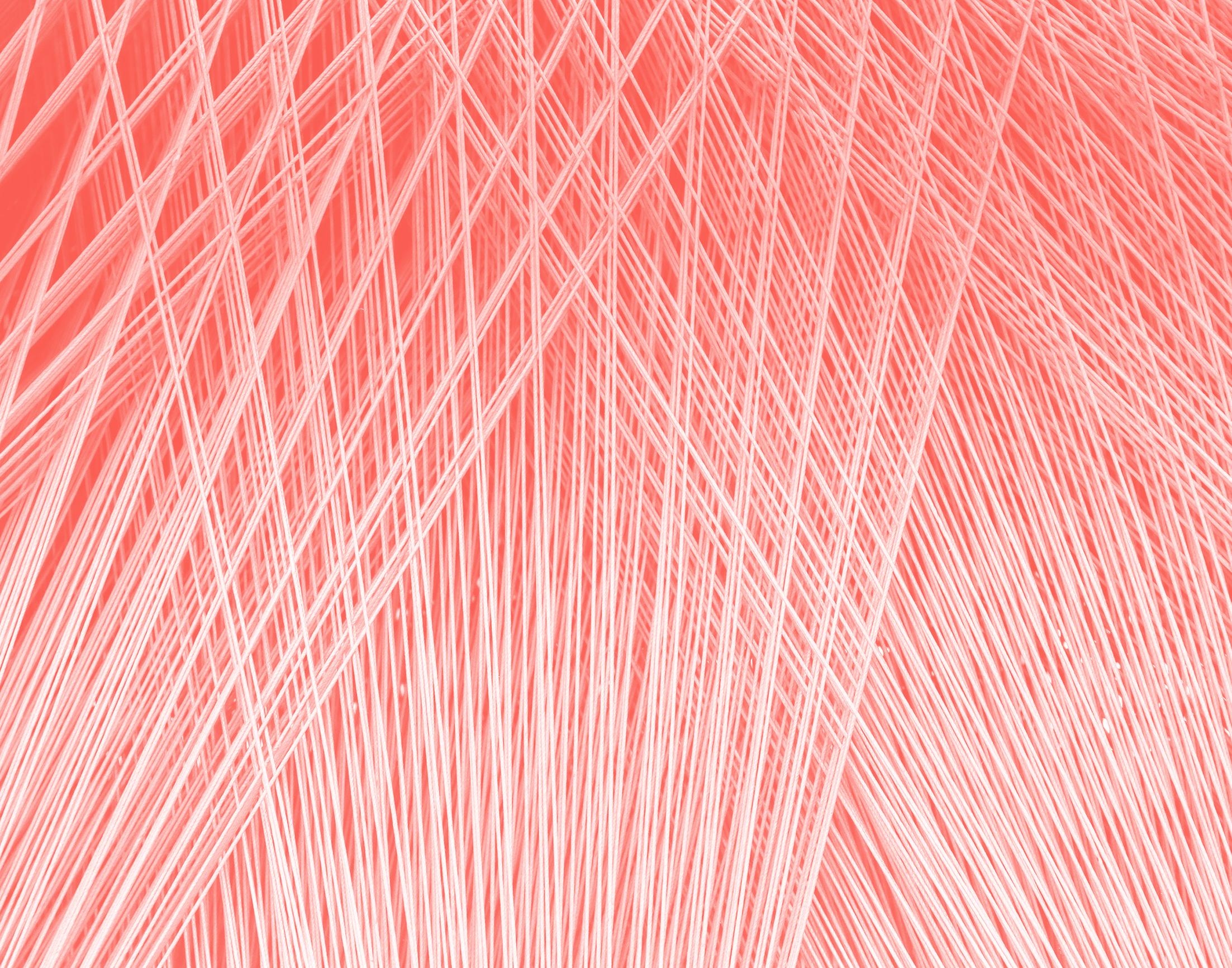 pattern of woven strings with a red overlay color
