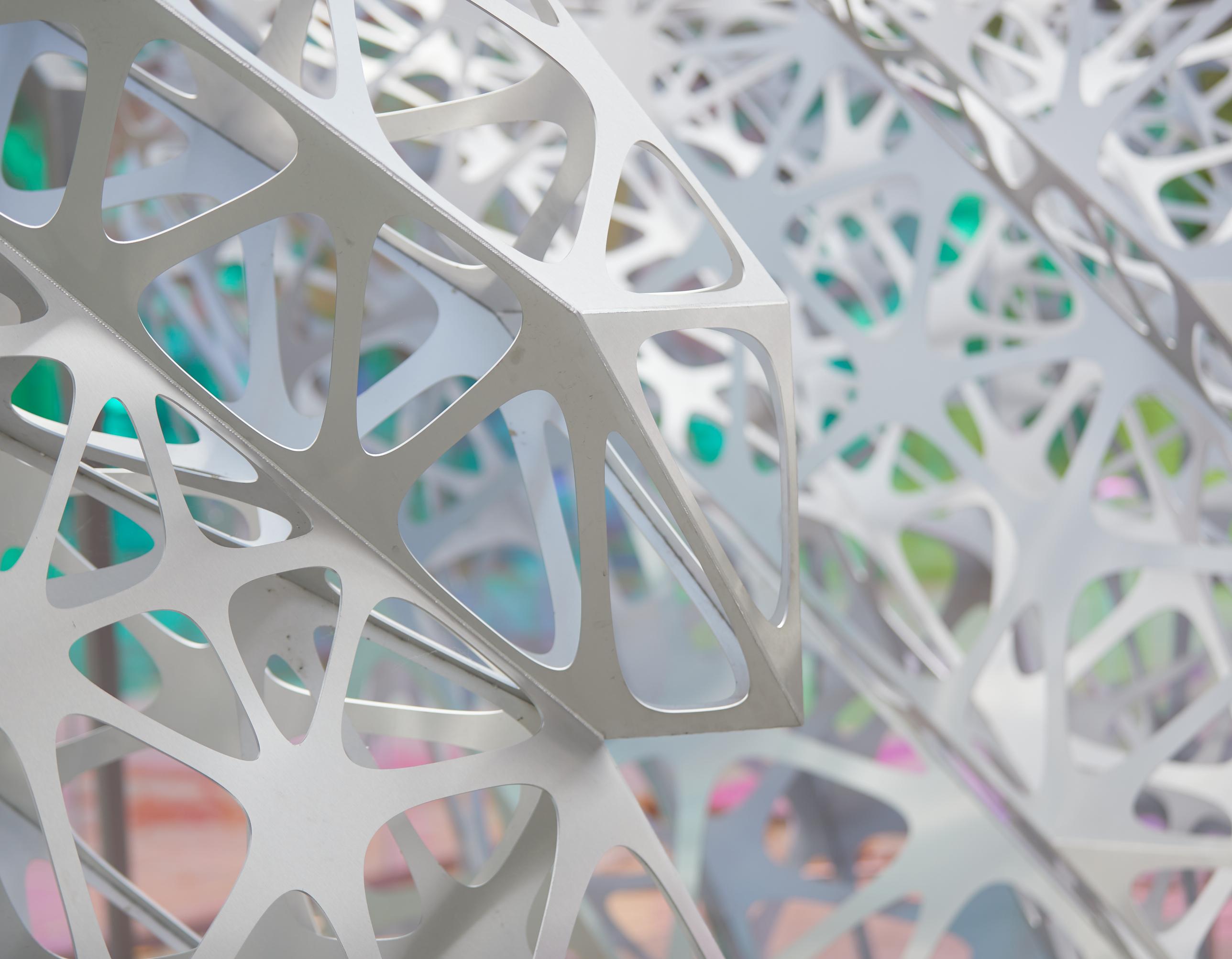 close up of metal sculpture with geometric shapes