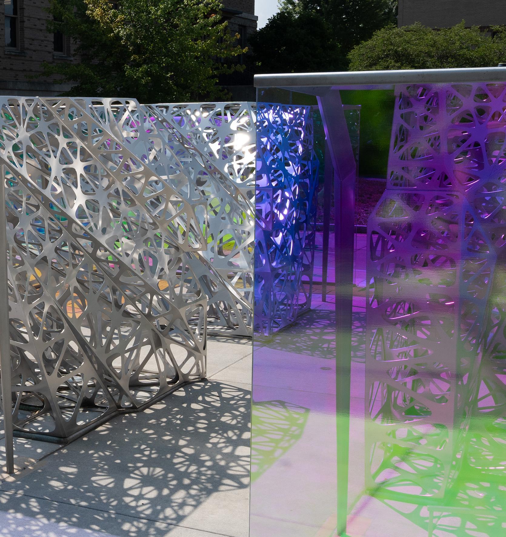 large outdoor metal and glass sculpture