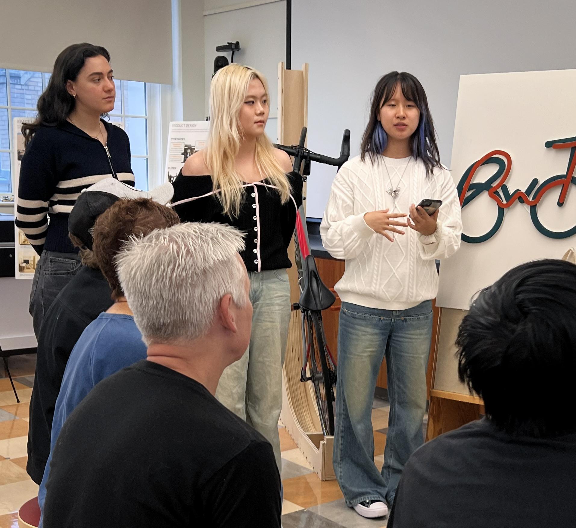 Students in So-Yeon Yoon's class present their work to community partner Bike Walk Tompkins