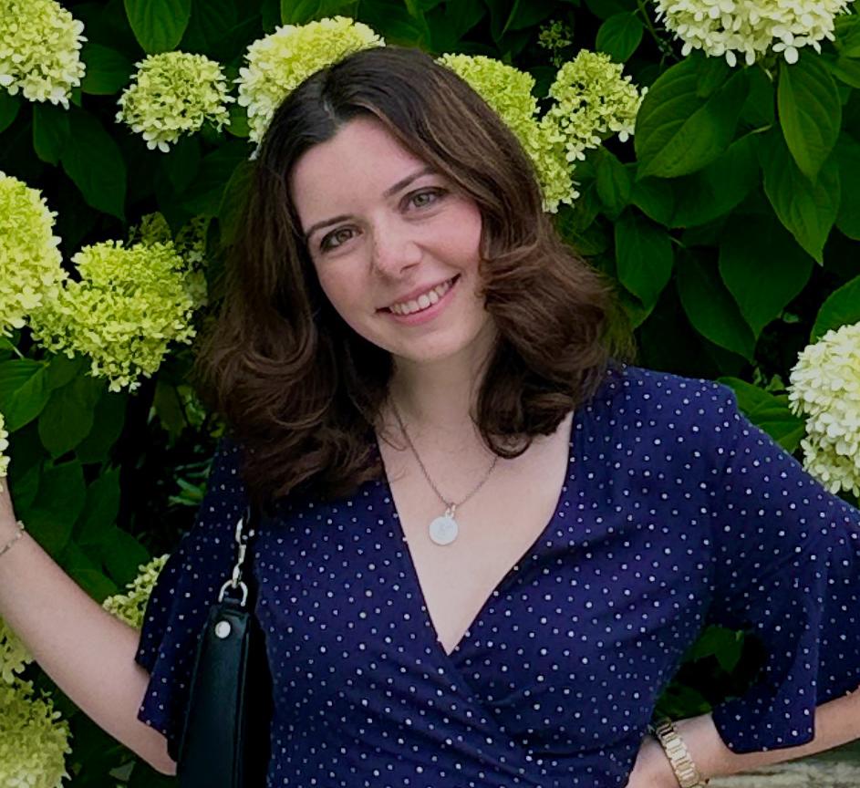 Portrait of Lauren Forstenhausler in front of green hydrangeas