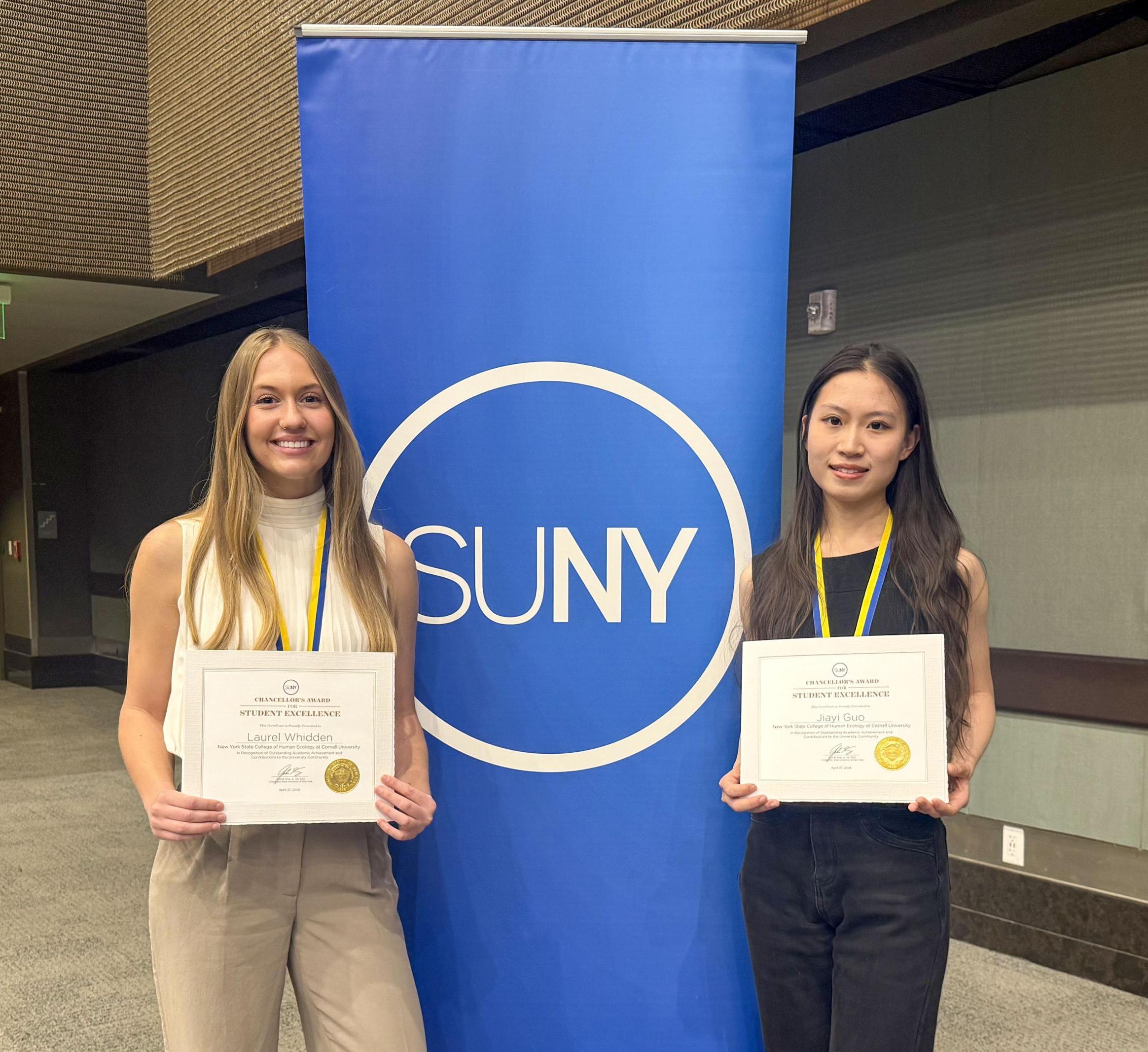 Lauren and Jiayi pose with their SUNY award