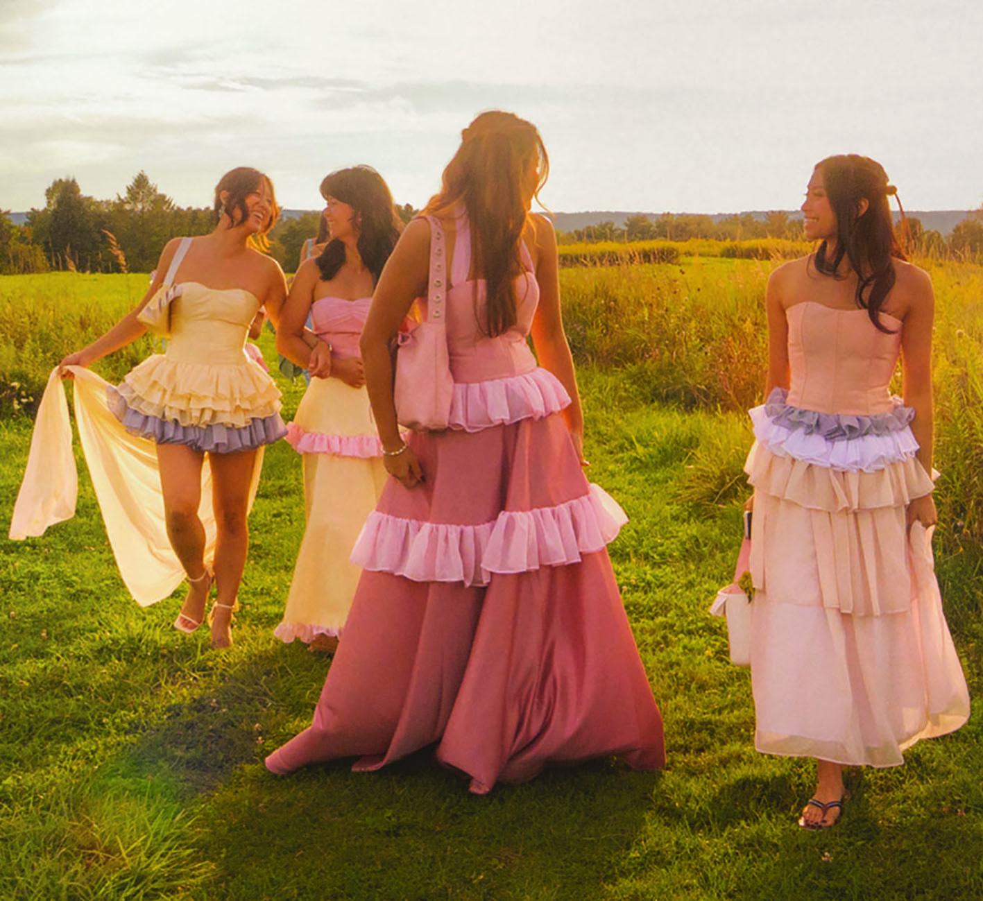Women in dresses in a field