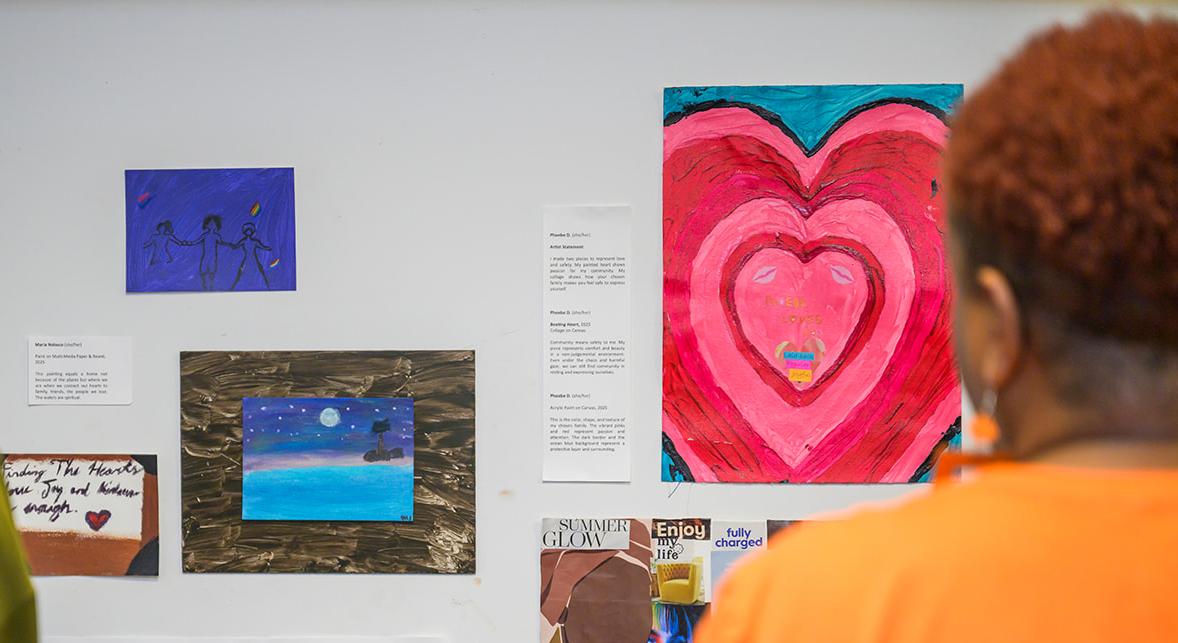 women looking at artwork in a gallery