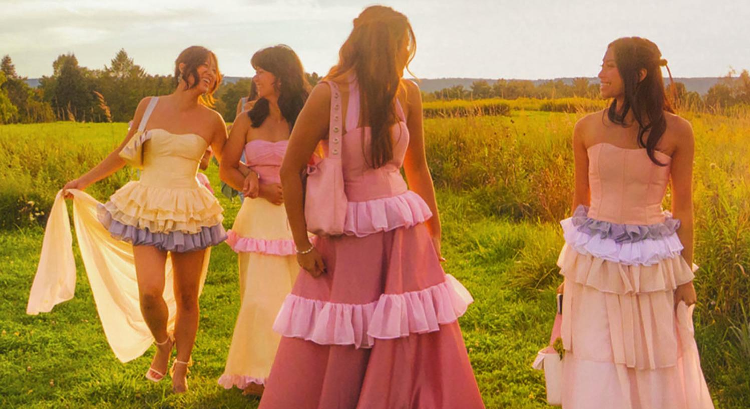 Women in dresses in a field