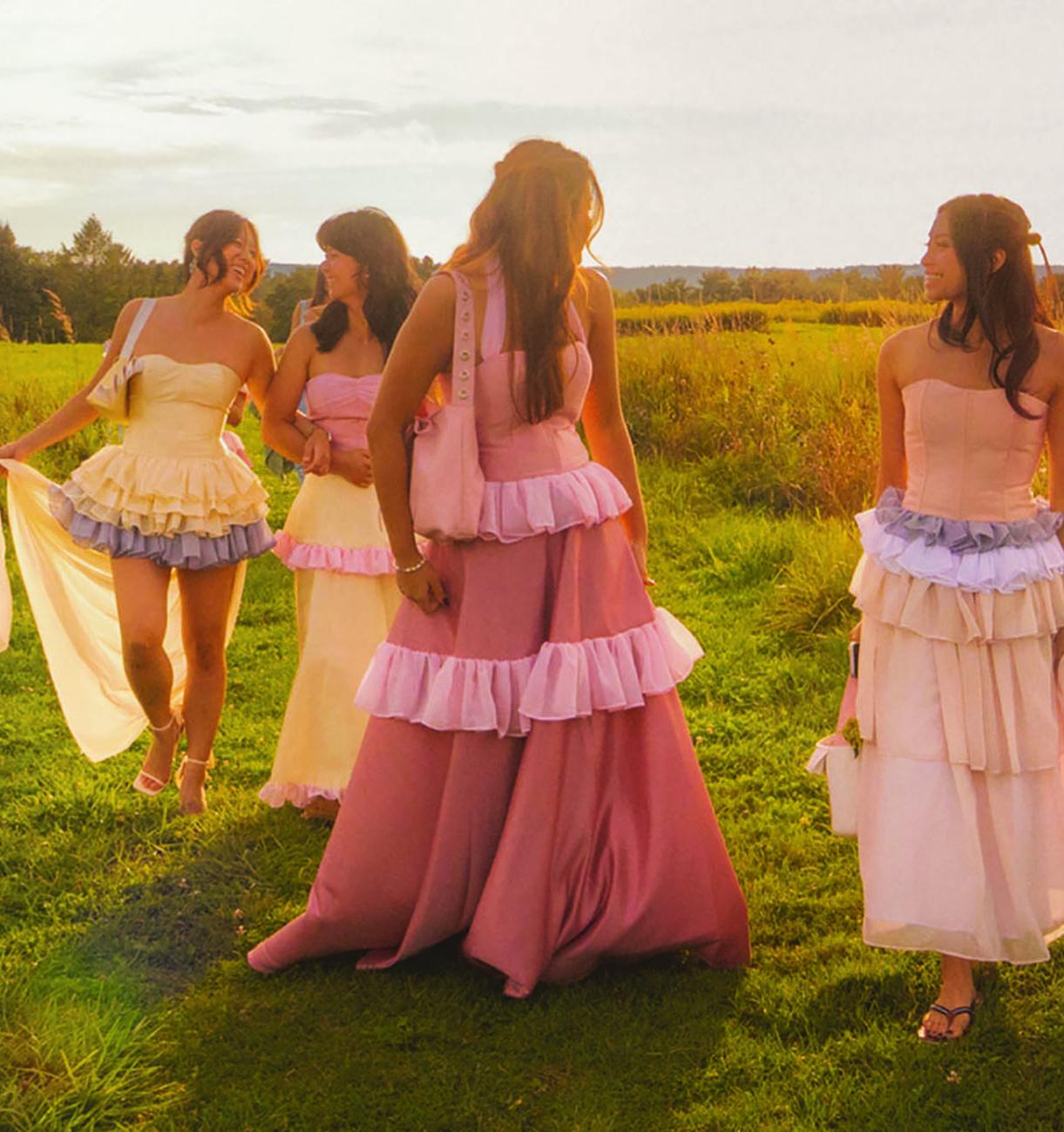 Women in dresses in a field