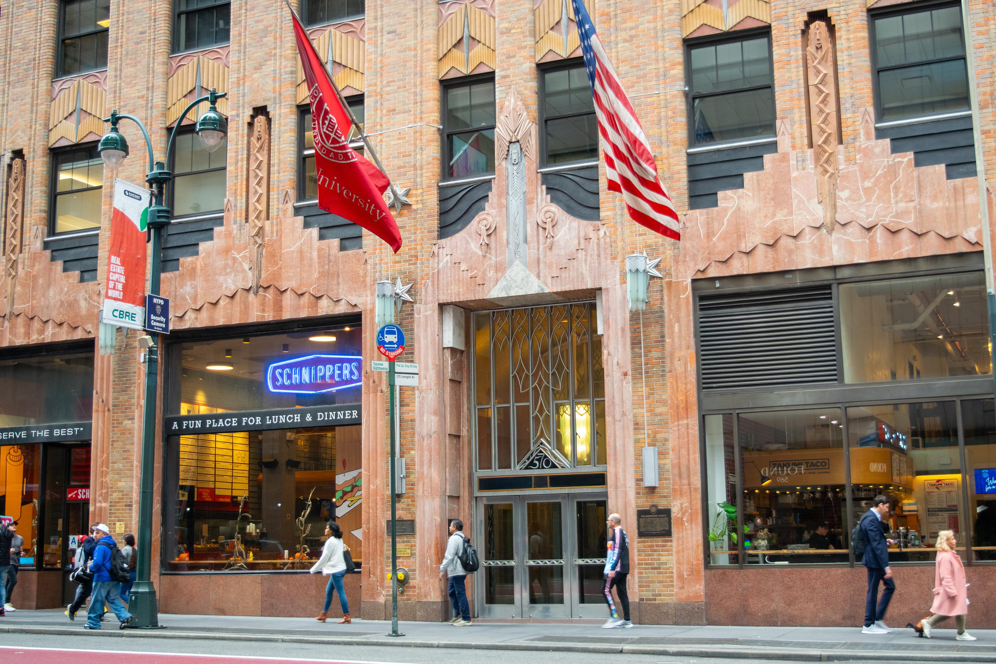 street level view of the art deco facade of a building in NYC