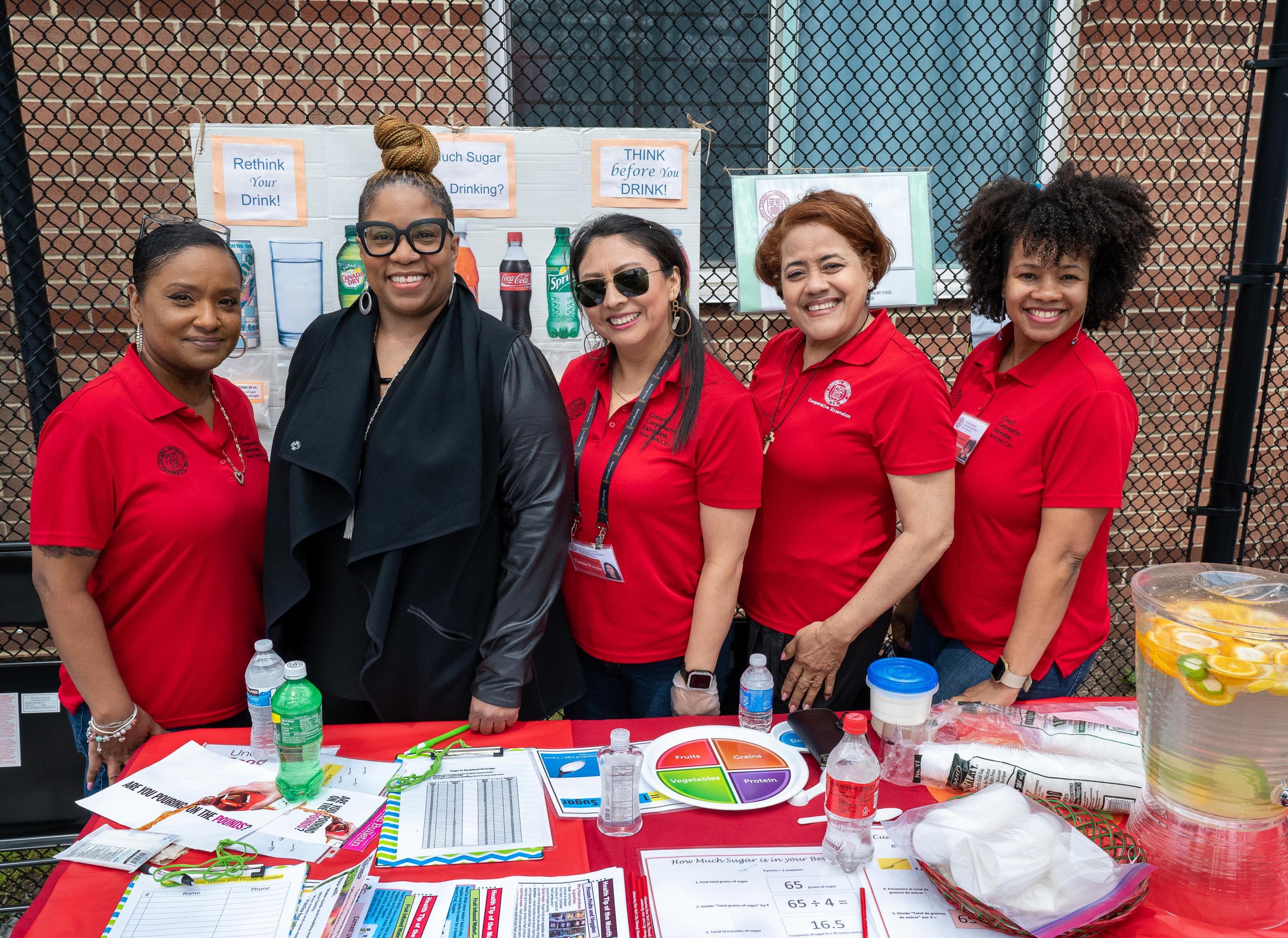 Angela Odoms-Young and EFNEP staff members provide information at an event