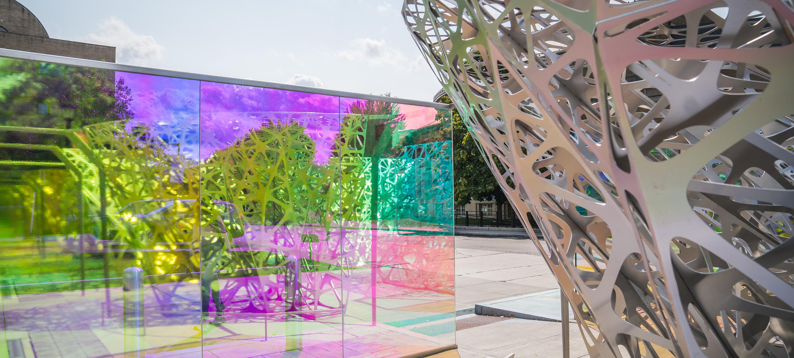 colorful glass and metal outdoor sculpture