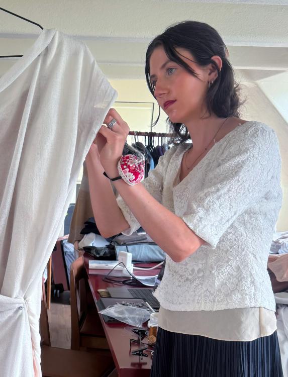 Kate Stiens tailors a dress