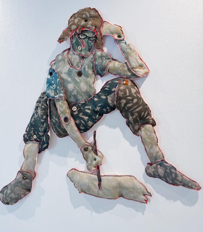 art made from stuffed fabric and cyanotype