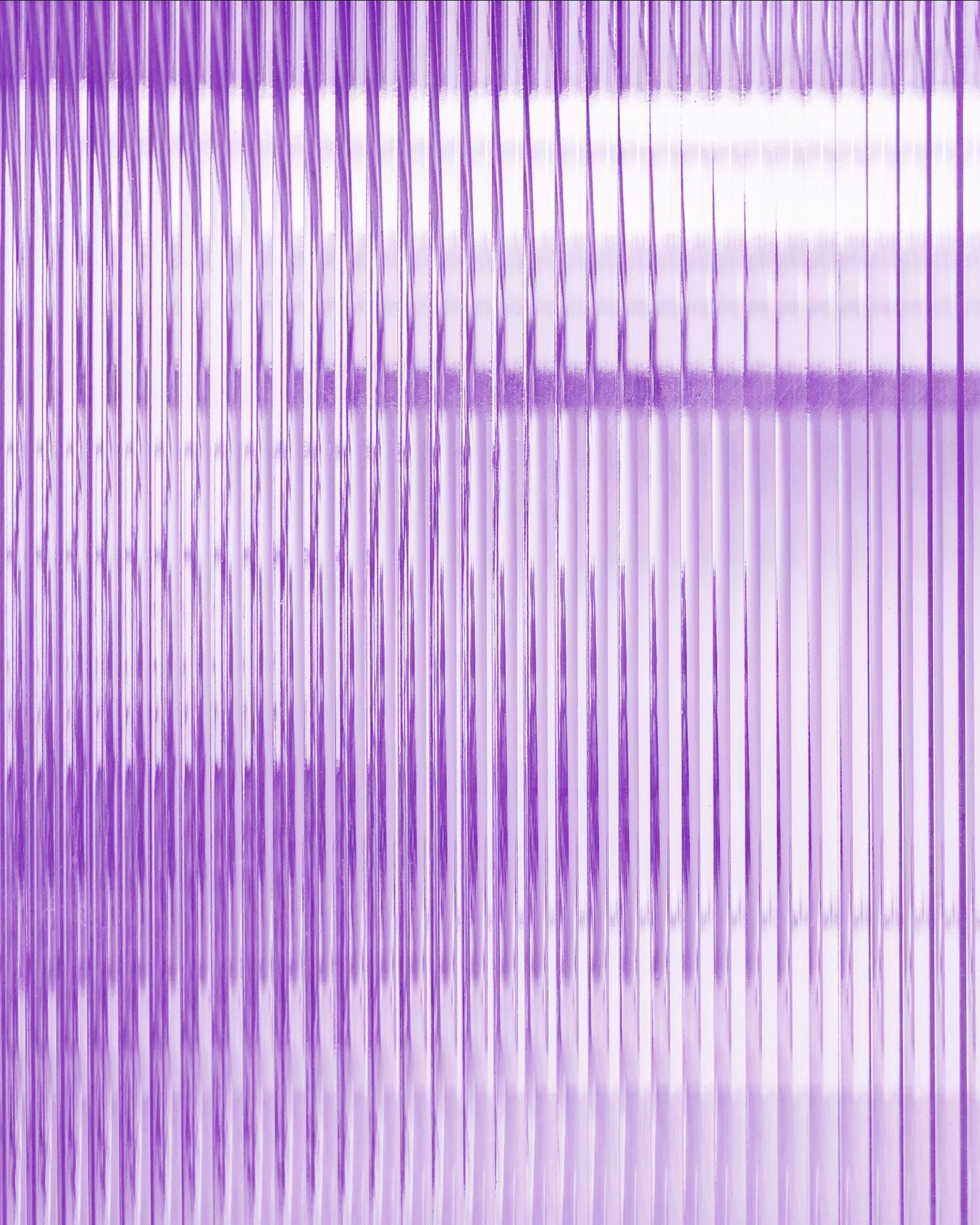 purple tinted image of a close up of ridged glass