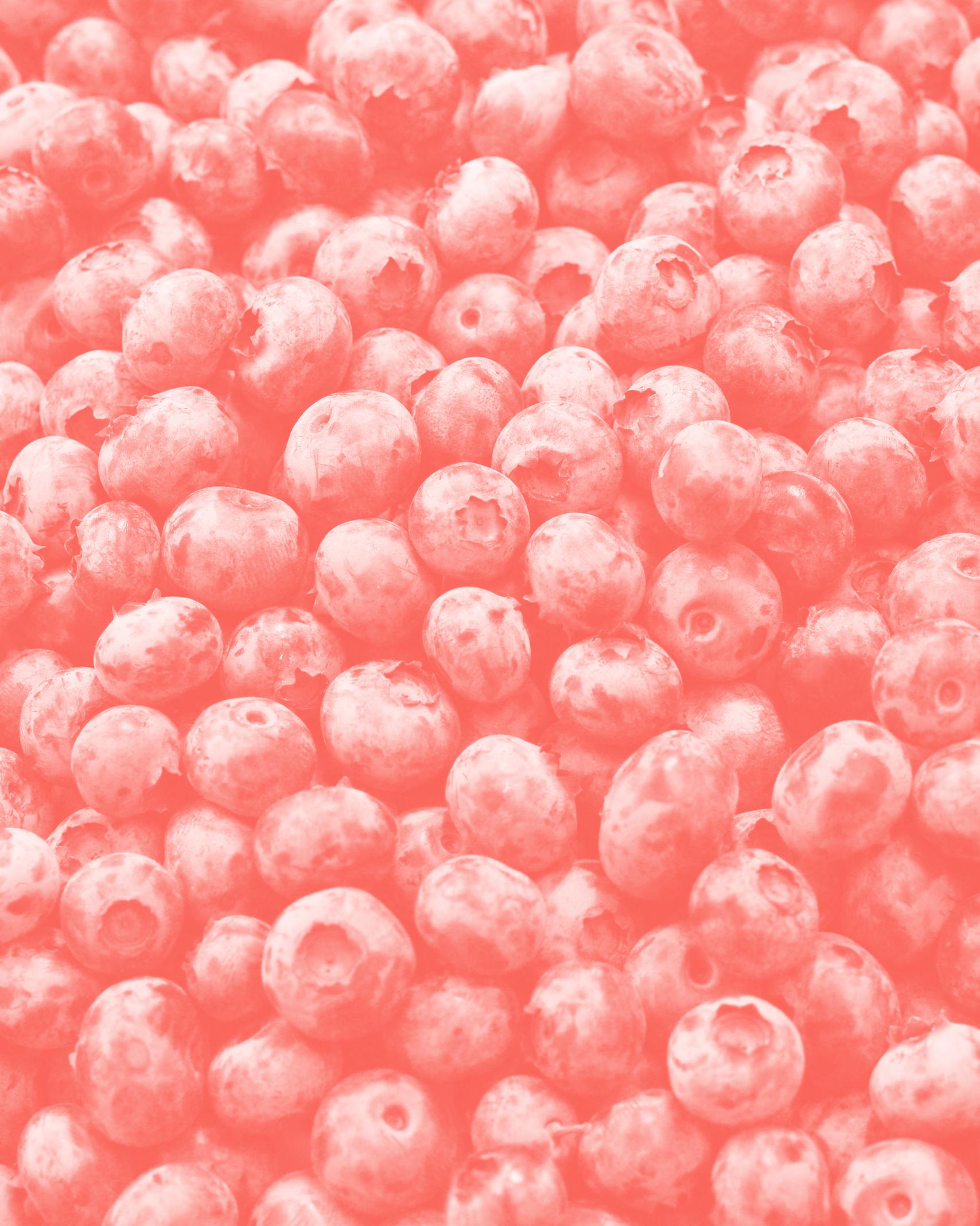 red tinted image of blueberries