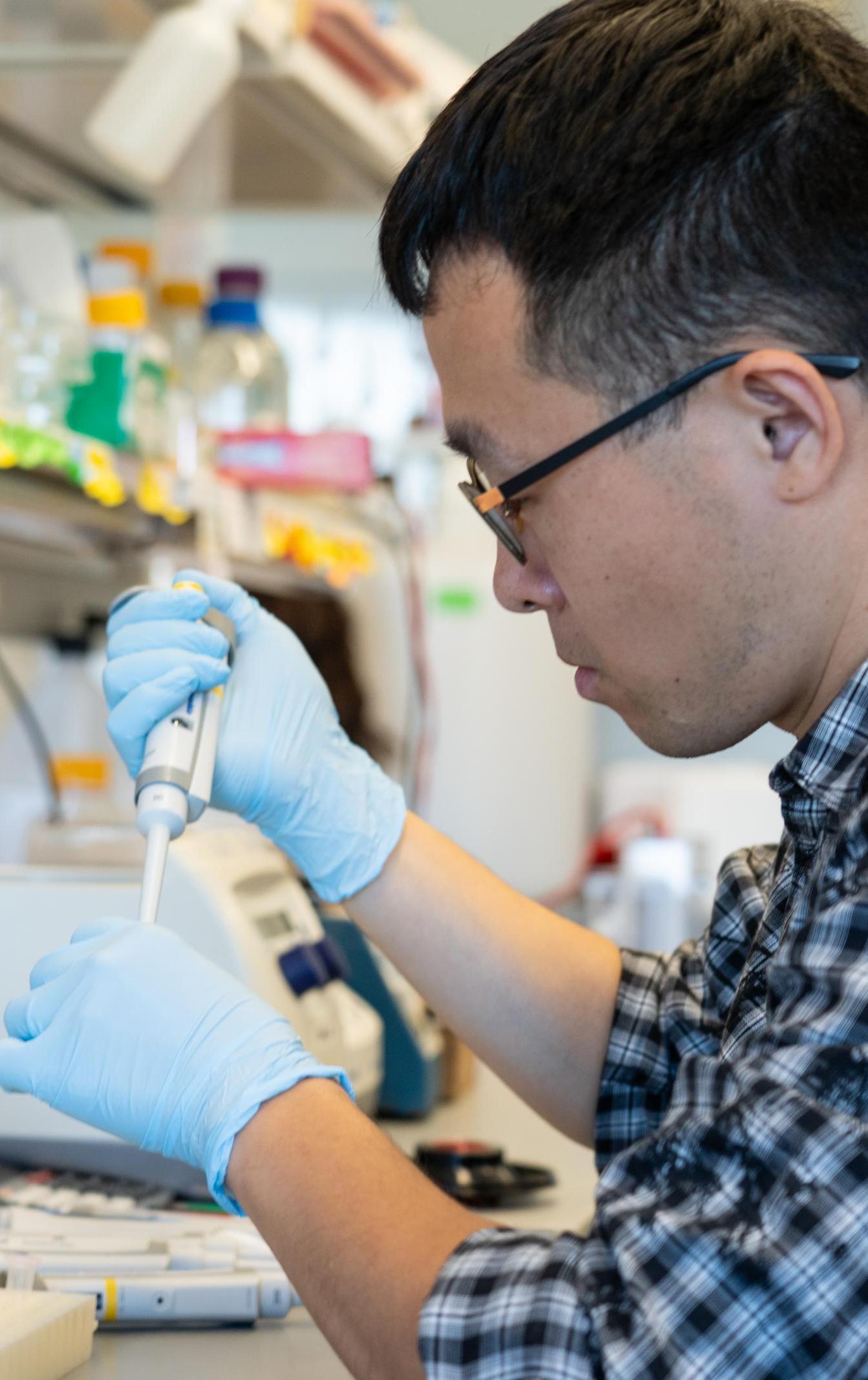 A graduate student works in a nutrition lab