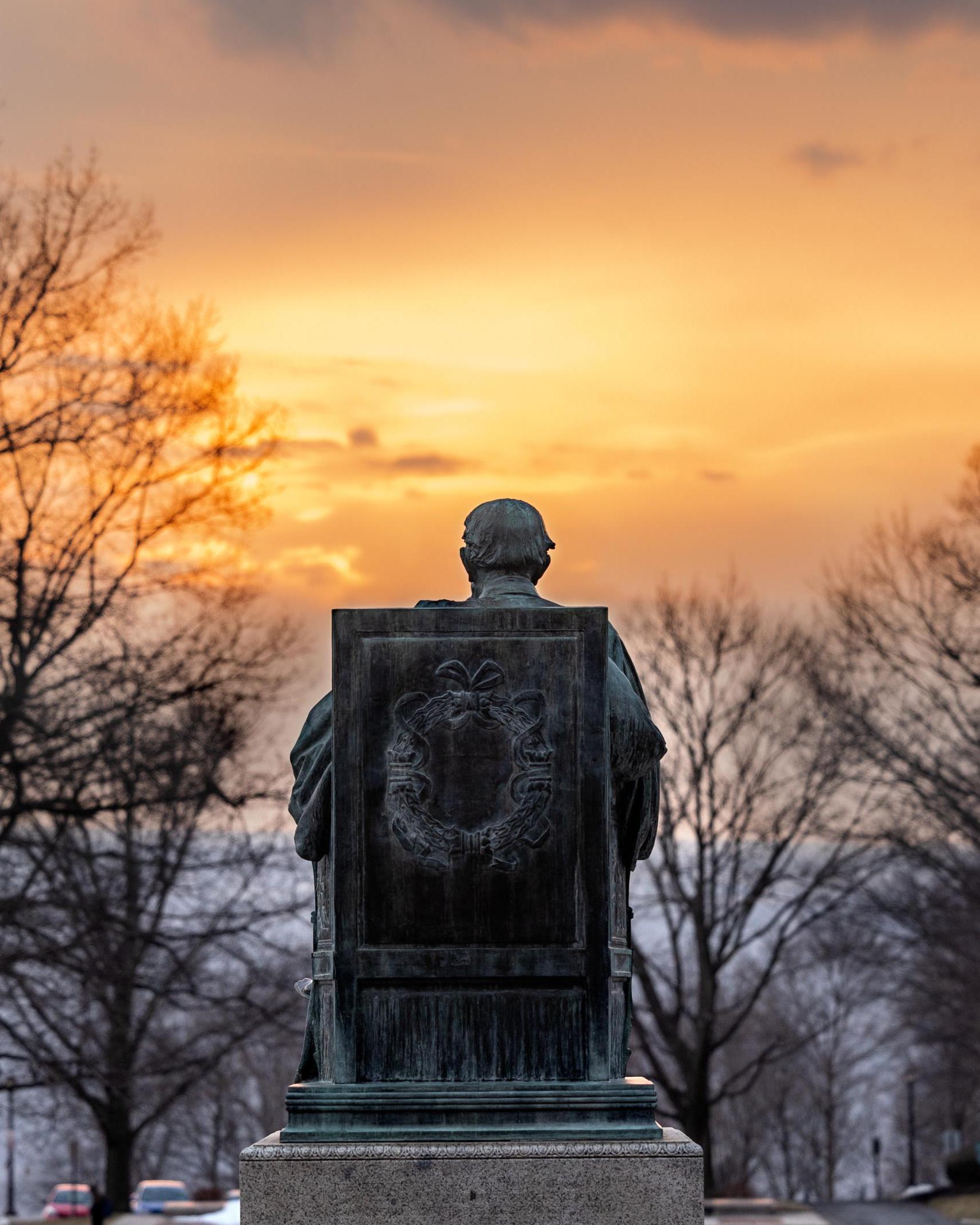 AD White statue at sunset