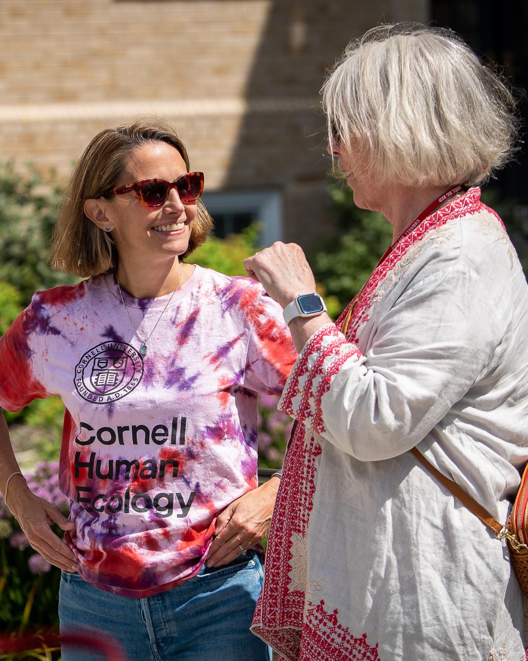 A faculty member speaks to Dean Dunifon