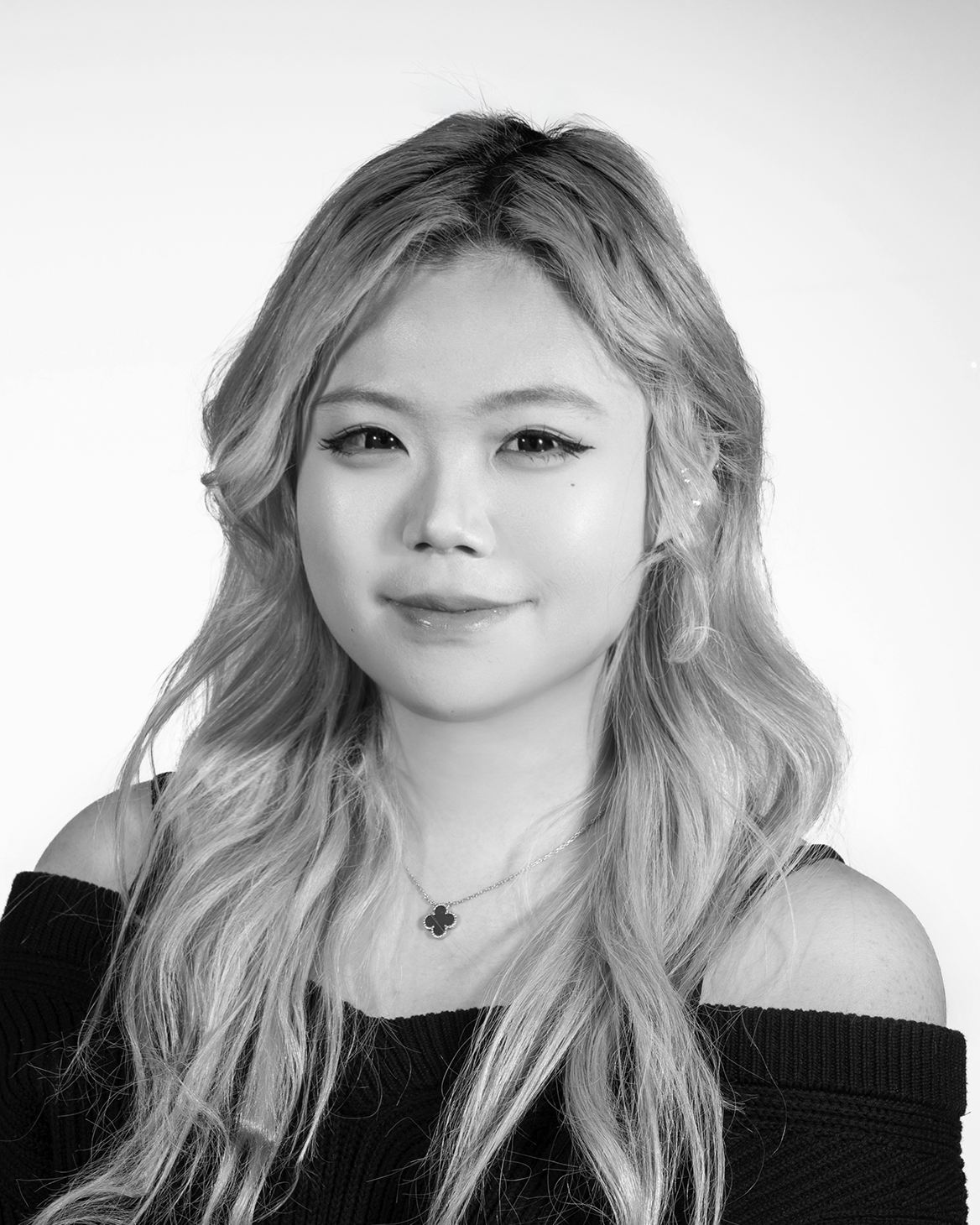 portrait of a person with long blonde hair