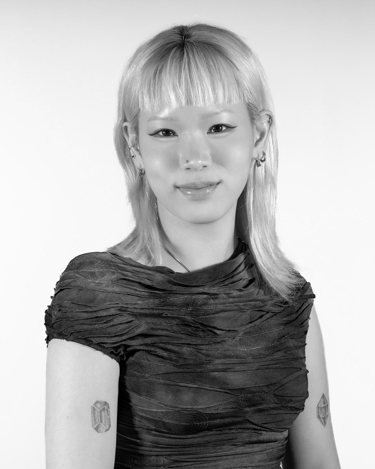 portrait of a person with blonde hair