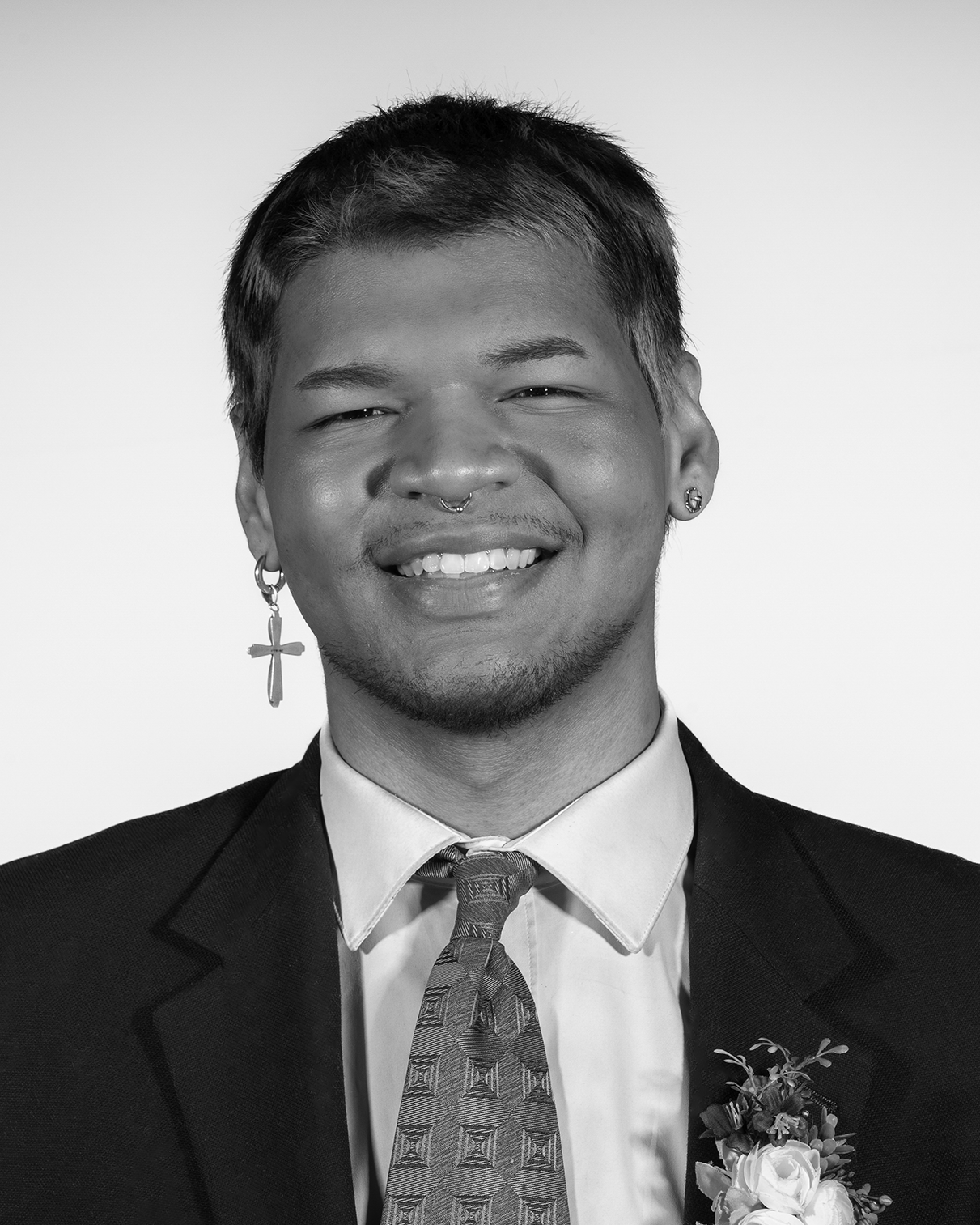 portrait of a person wearing a jacket and tie