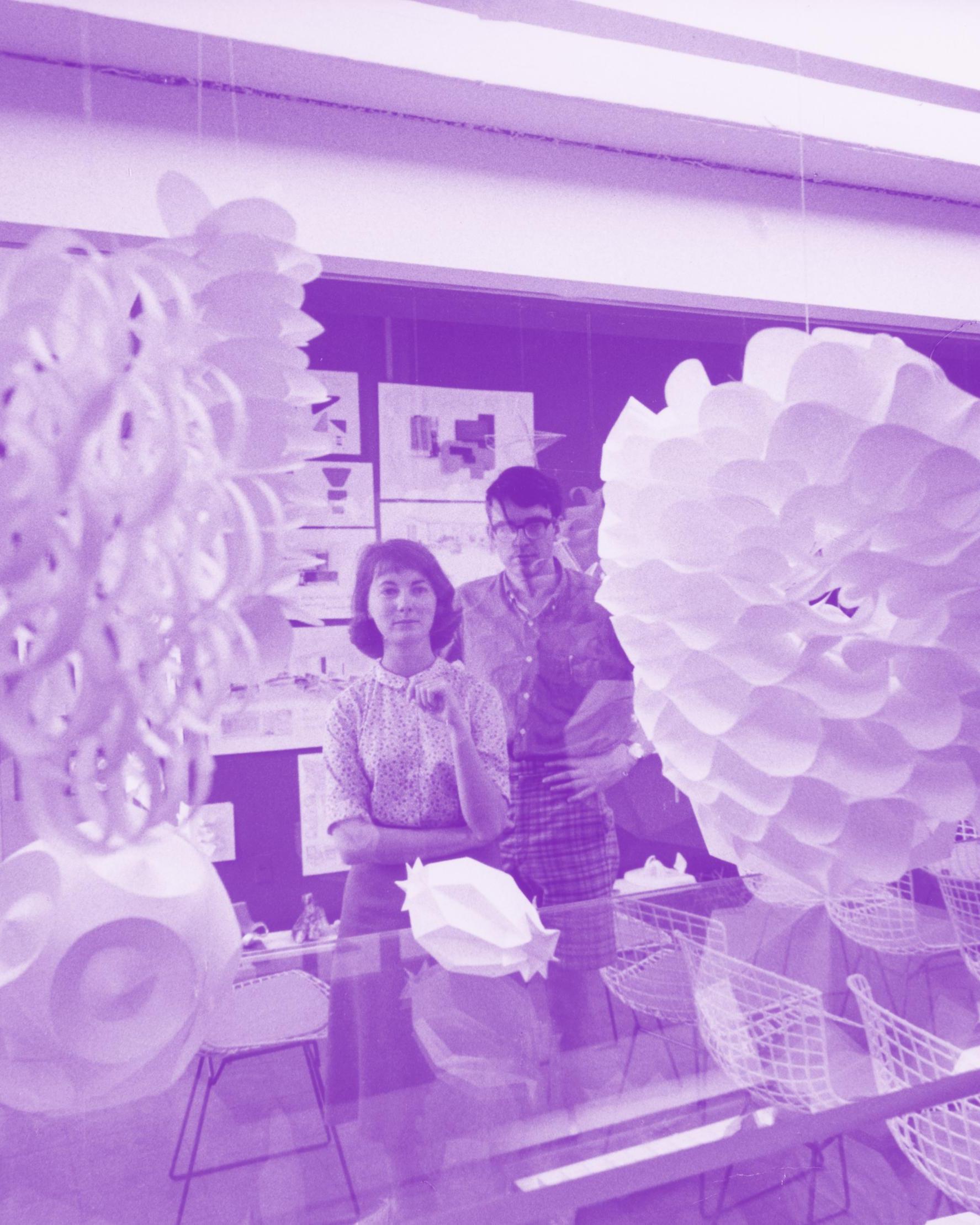 Students view 3D designs in a lab (historic photo circa 1975)