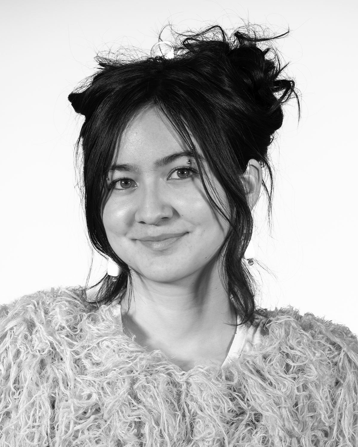 portrait of a person in a shaggy sweater