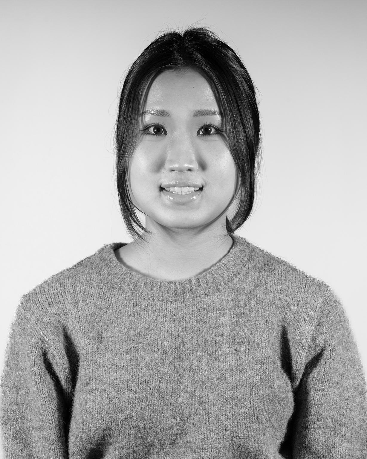 portrait of a person wearing a sweater