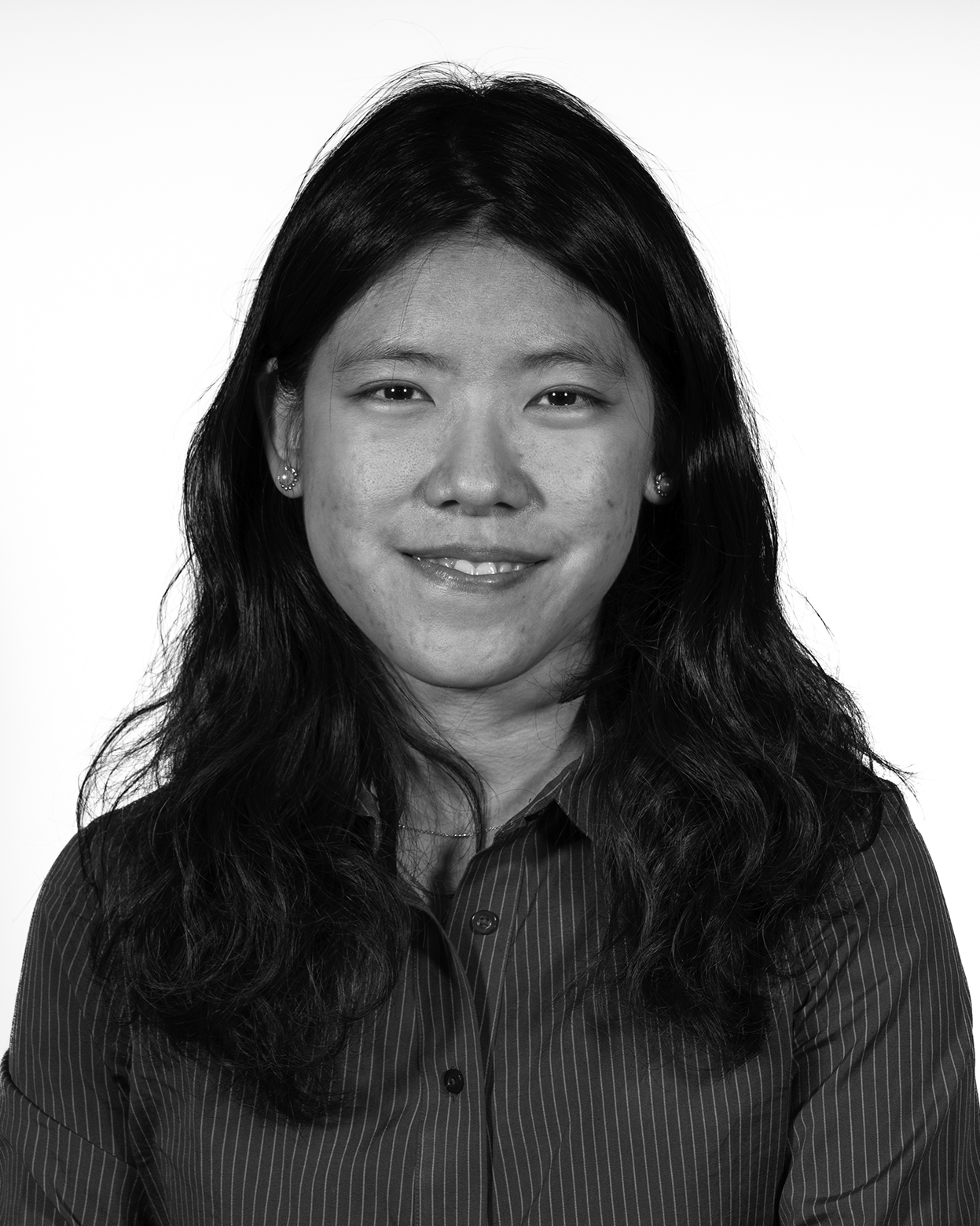 portrait of a person with long dark hair