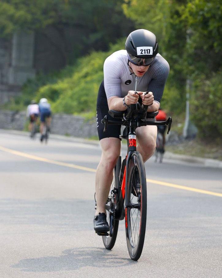 Hanlon riding a bike during an endurance race