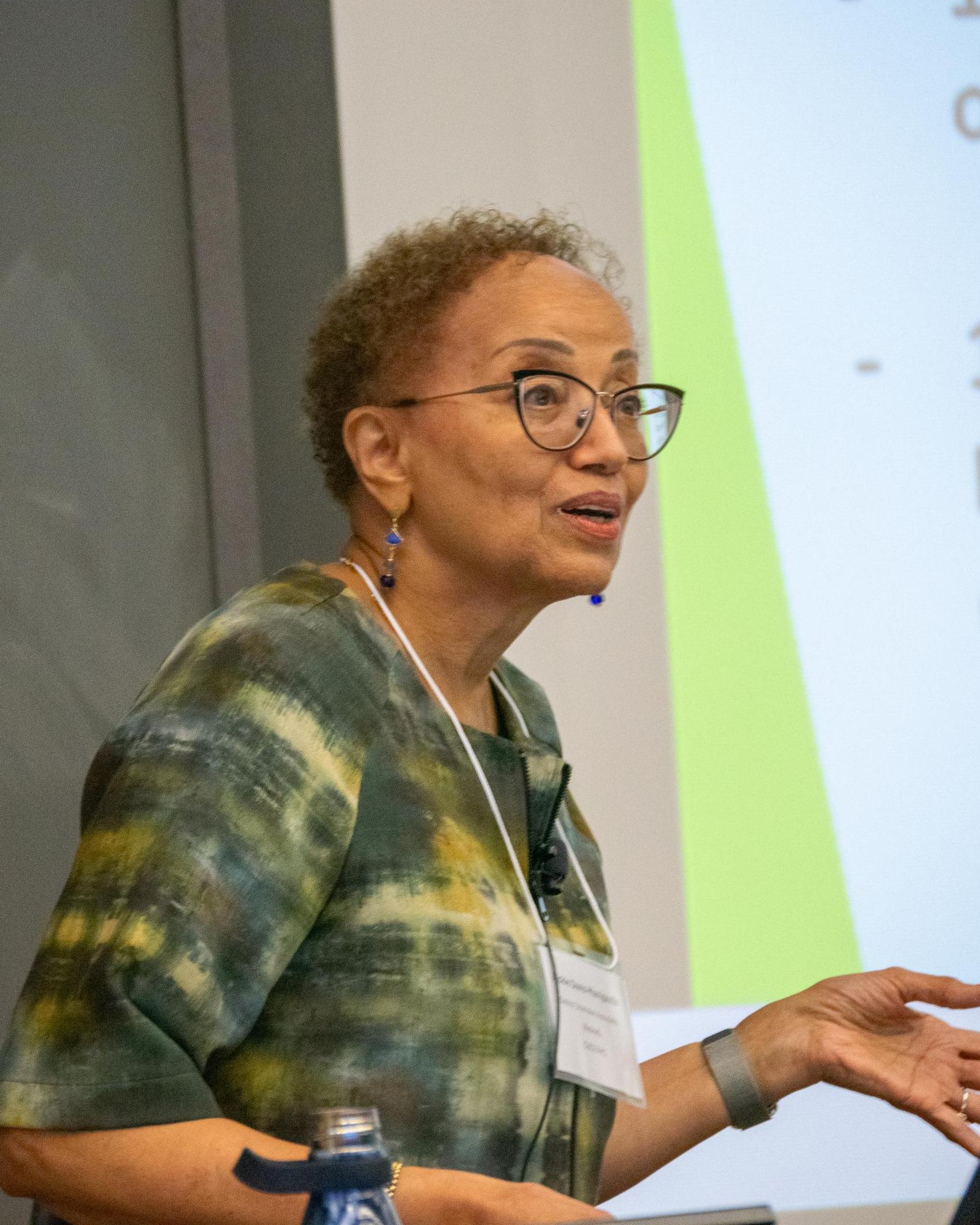 A female speaker giving a talk 