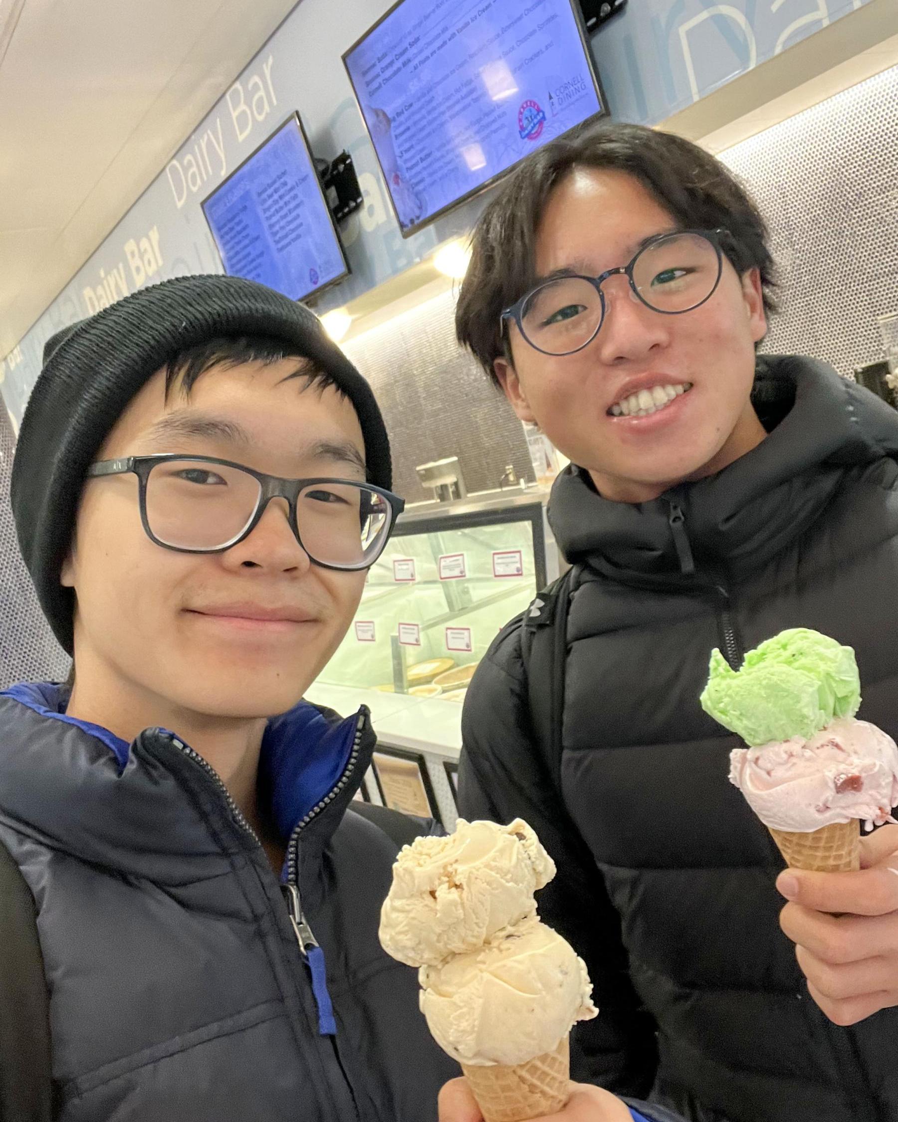 Wells Lee and a friend holding ice cream cones at the Dairy Bar