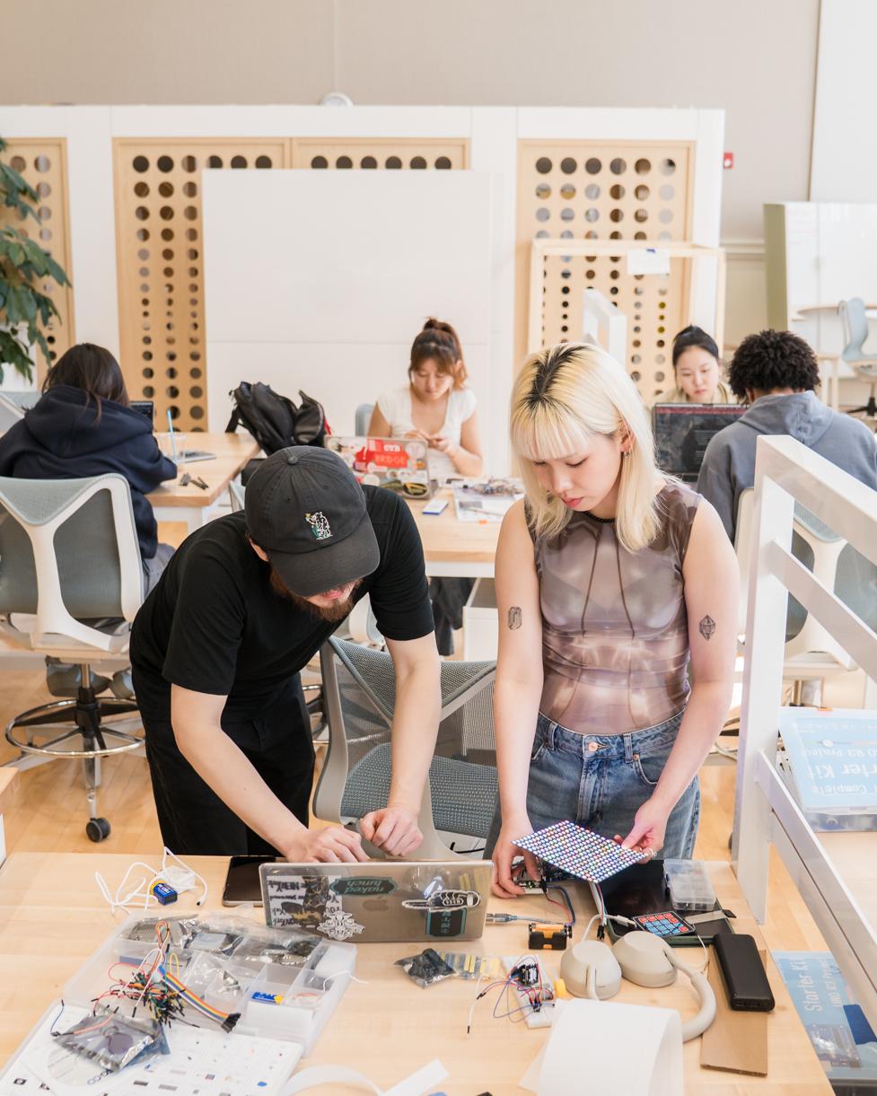 Students in a studio course in the dHIVE