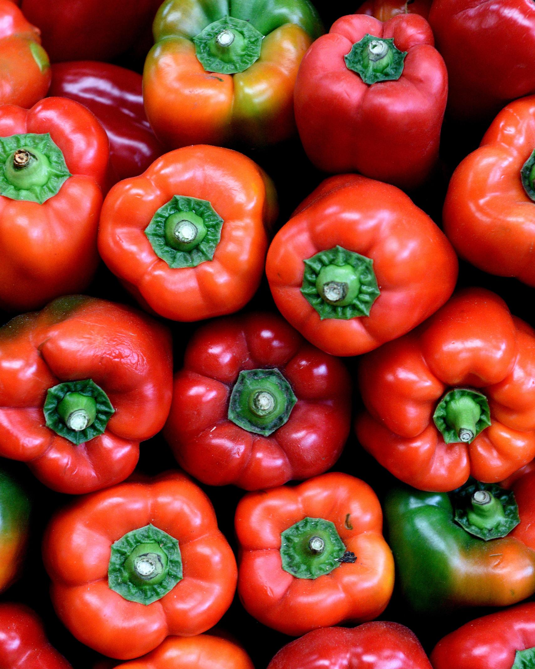 Stack of red bell peppers