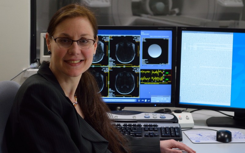 Professor Valerie Reyna in the control room of the MRI